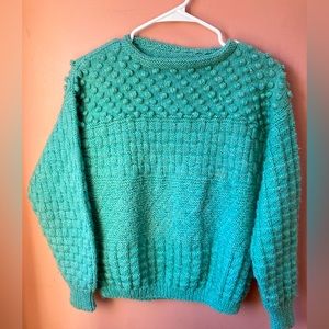 Hand made unique wool knit sweater.